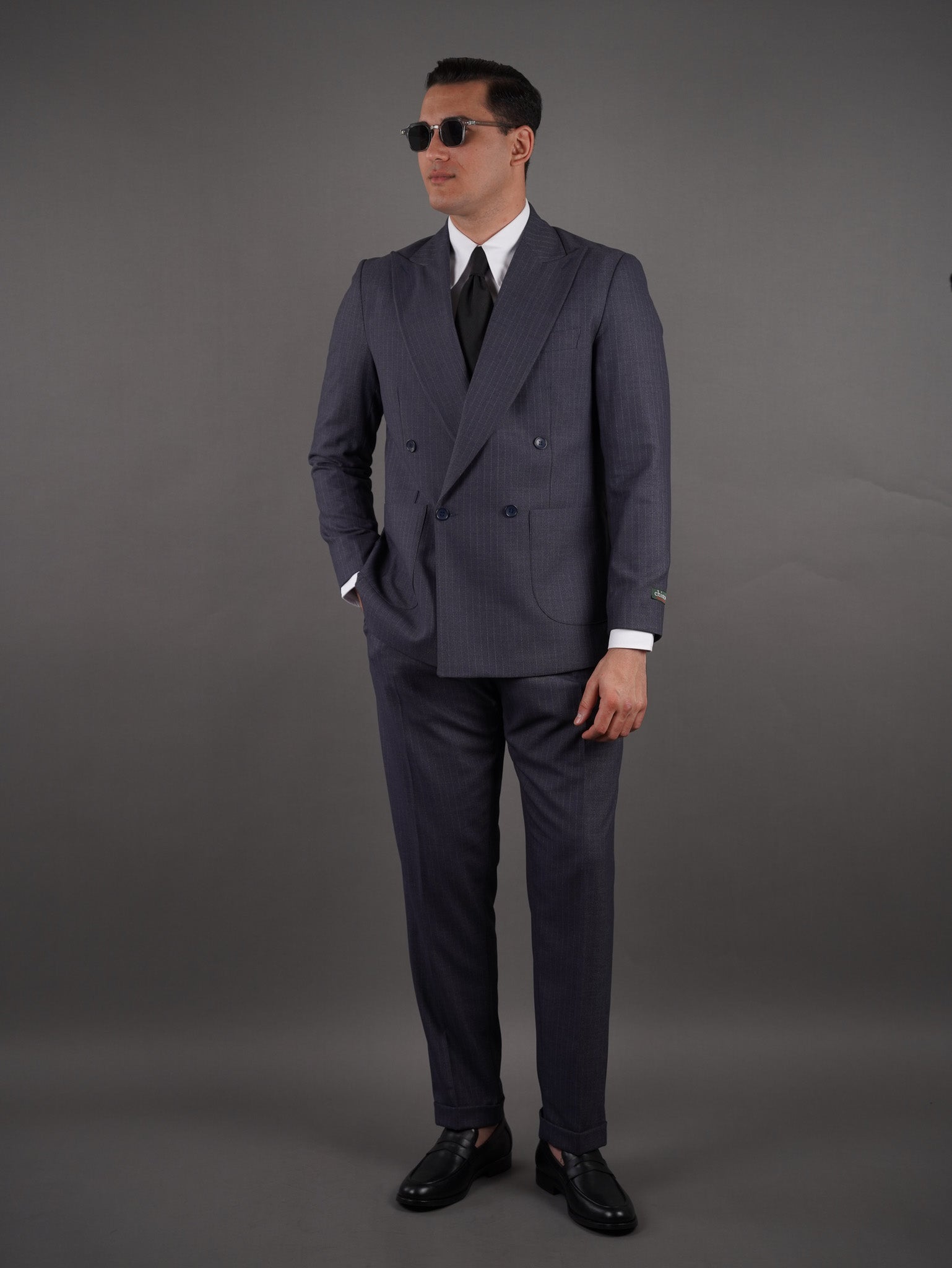Four-Button Double-Breasted Unlined suit - gray striped